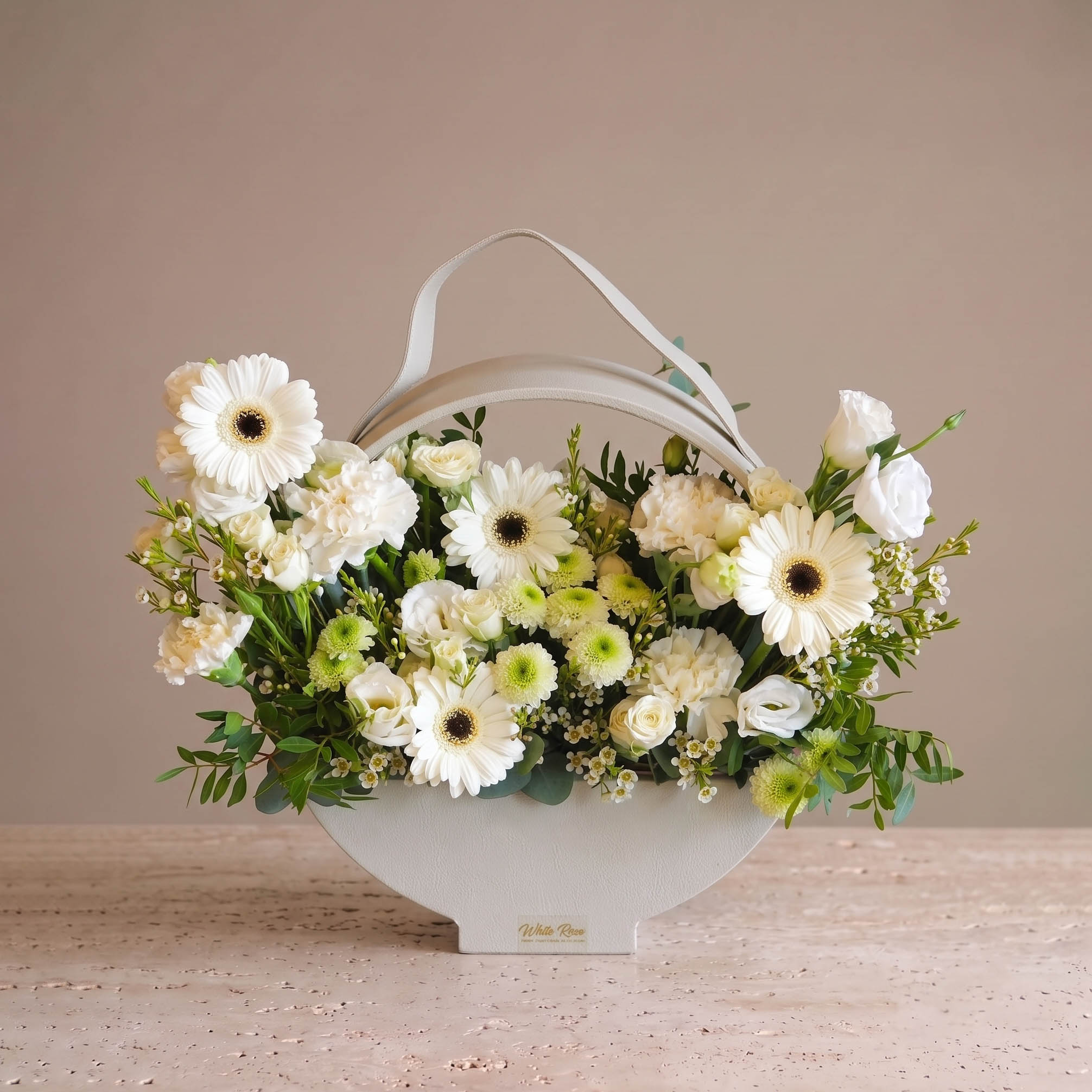 Blooms in Leather Basket